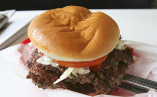 A smashed burger from Schoop’s (Photo: Kevin Pang)